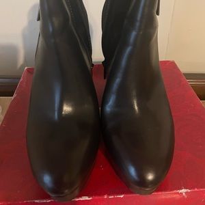 Carlos black wedges.